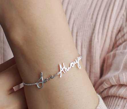 Bracelet with a handwritten message that says 