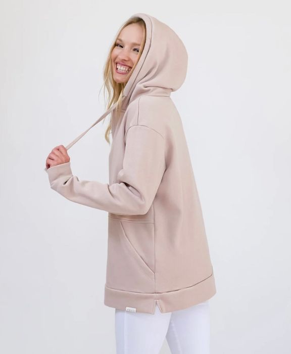 Model wearing the pink hoodie
