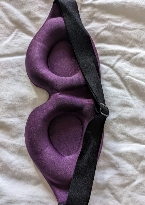 Reviewer photo of the underside of the purple mask, highlighting its contouring around the eyes