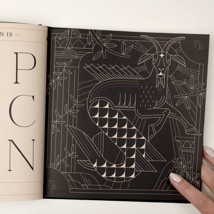 The Sagittarius symbol featured within the pages of the book