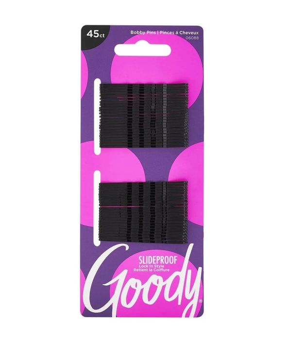 A pack of bobby pins in a purple and pink package