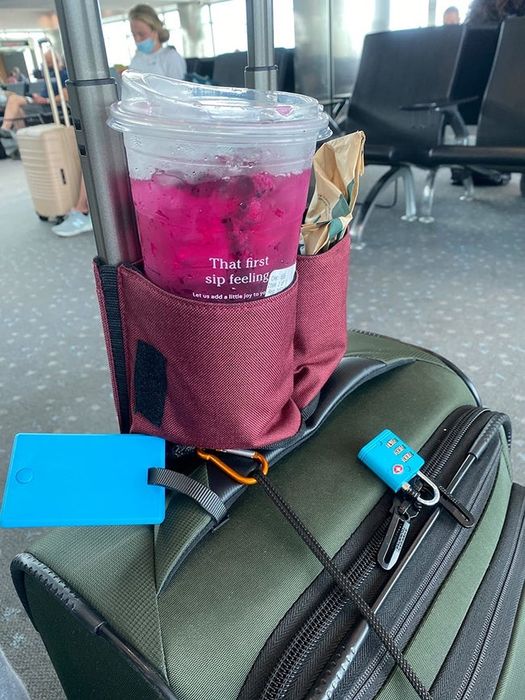 reviewer's cup caddy with a Starbucks drink and snack