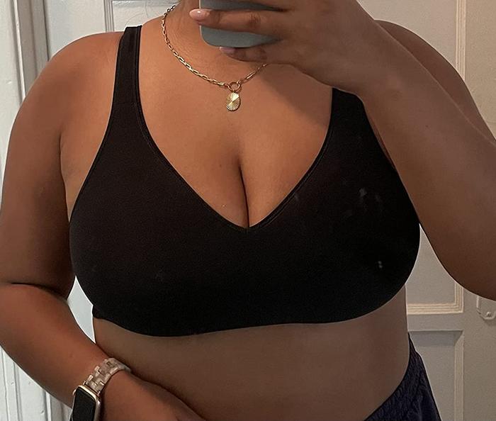 Reviewer wearing the black seamless bra