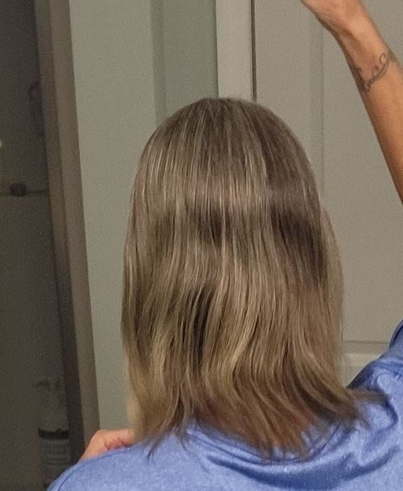 Reviewer's hair after applying the conditioner spray