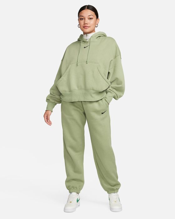 Model showing off the mint green hoodie and sweatpants set