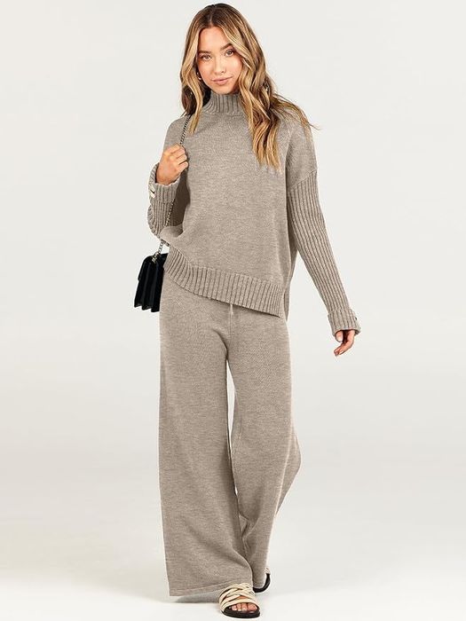 A model strikes a pose in the light brown turtleneck sweater set.