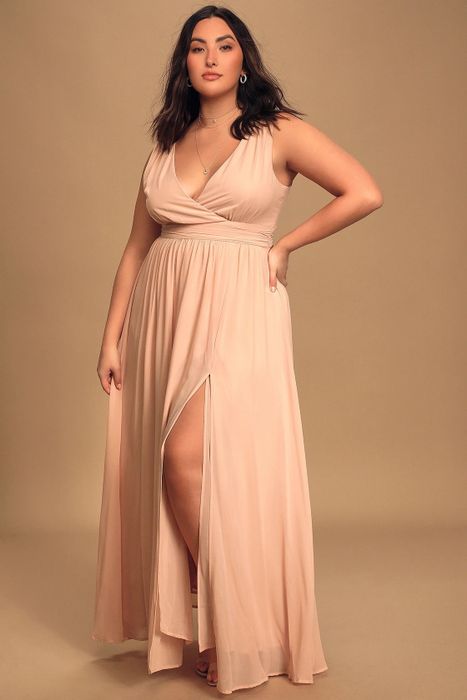 A model in a pink dress.