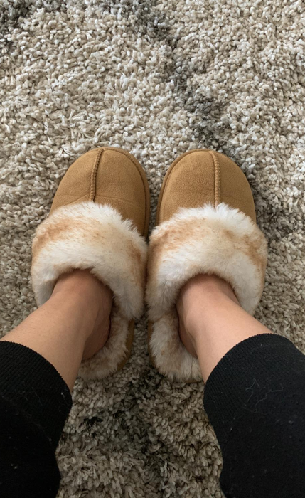 A reviewer provides a close-up view of their brown slippers.