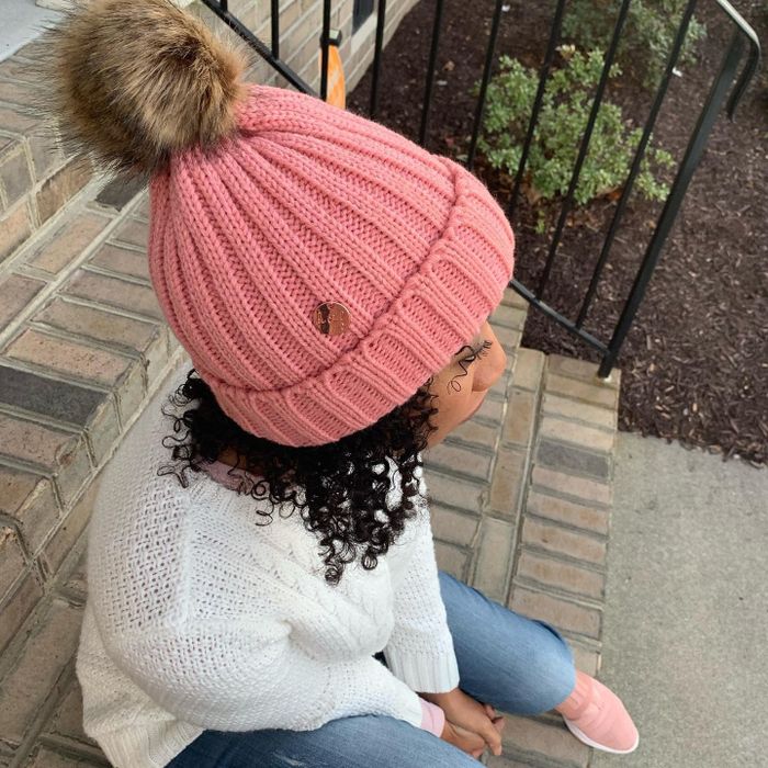 shop owner rocking the pink beanie