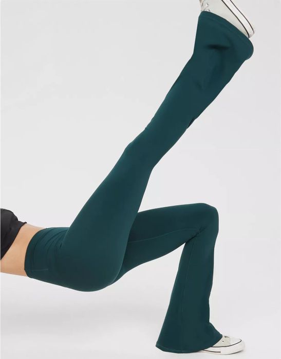 Model showcasing the dark green leggings