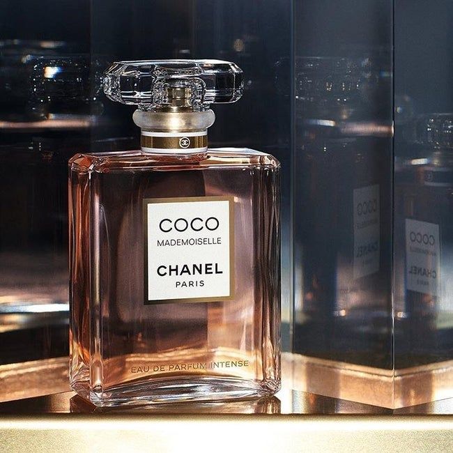 Close-up image of an elegant glass perfume bottle