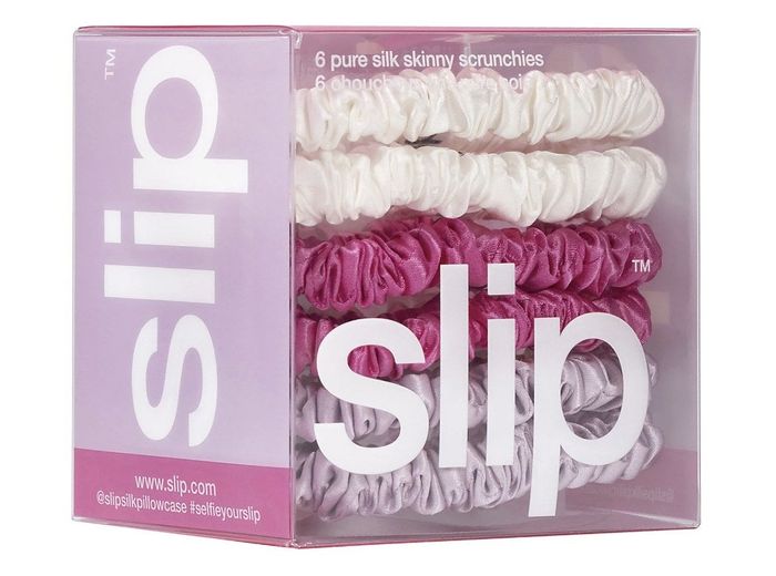 the pack of six scrunchies, in white, pink, and purple hues