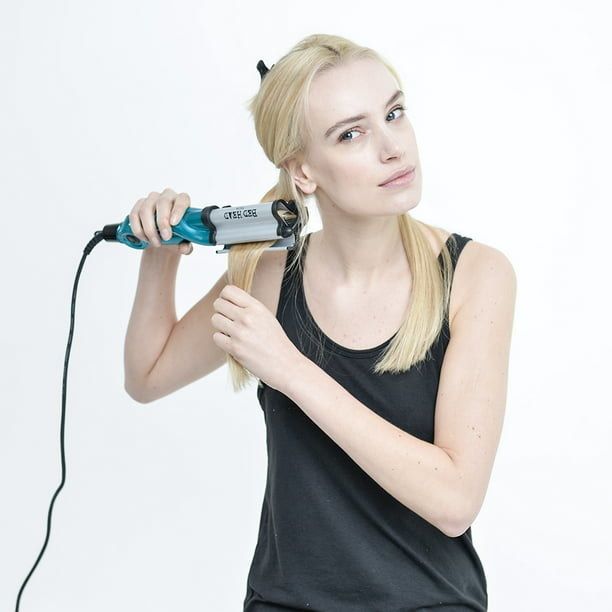 model demonstrating the use of the hair waver