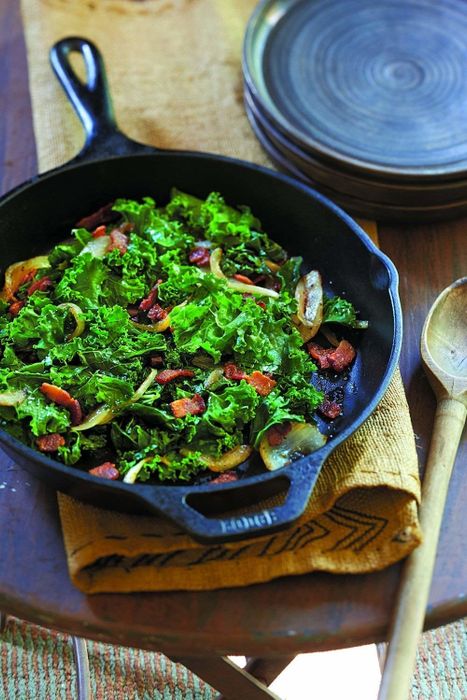 A skillet filled with sautéed vegetables.