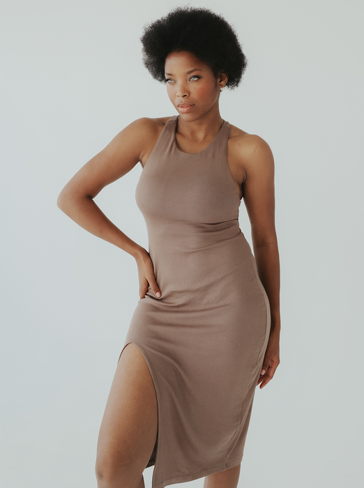 a model wearing the same dress in light brown