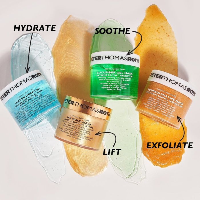 The four masks (green, blue, orange, and gold) displayed next to the kit box.