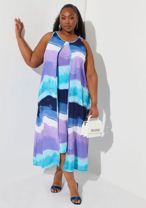 A model wearing the watercolor dress