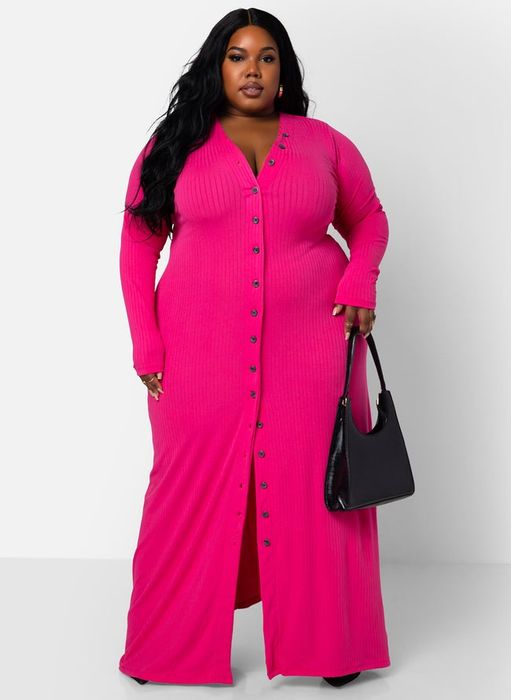 a model showcasing the same button-front dress in a striking fuchsia hue