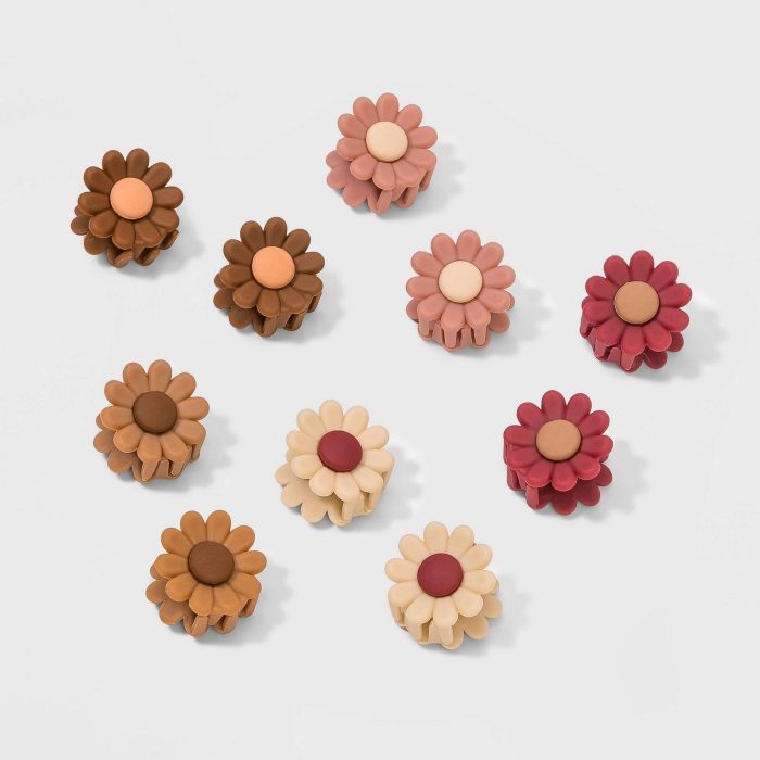 Pink, brown, tan, red, and cream flower-shaped hair clips