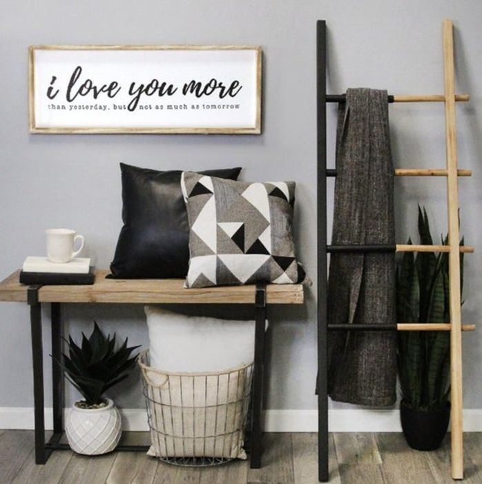 The sign on the wall says: I love you more than yesterday, but not as much as tomorrow