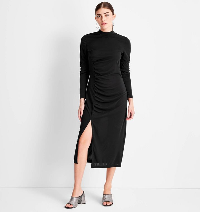 a model donning the same dress in classic black