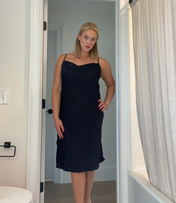 Another reviewer wearing the dress in classic black.