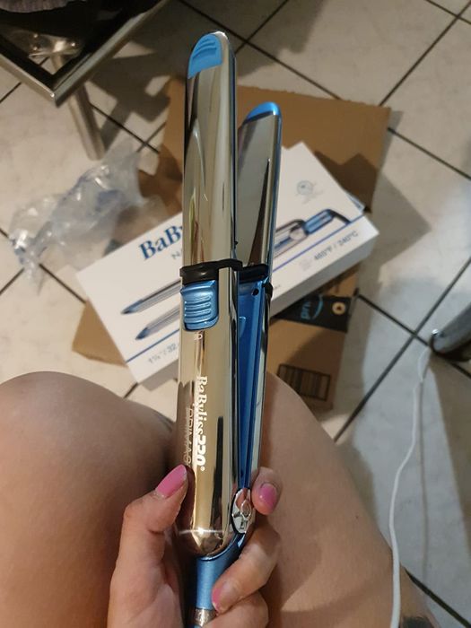 Here I am, holding the flat iron