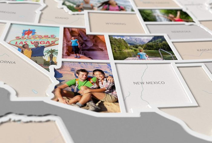 A close-up shot of photos neatly placed in the corresponding states on the map.