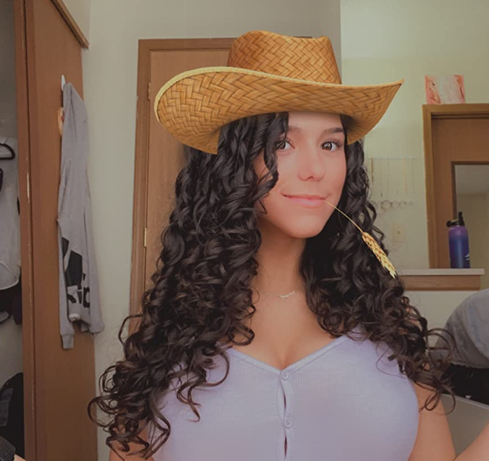 A reviewer's curls after using Camille Rose moisturizer