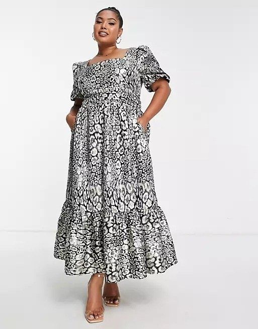 A model wearing the leopard-print dress