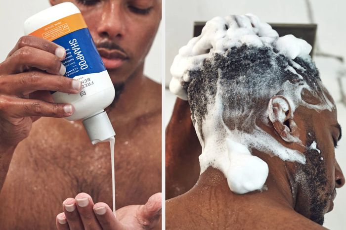 Model squeezing a blue and orange shampoo bottle with a white formula into their hand, then massaging the product into sudsy hair.