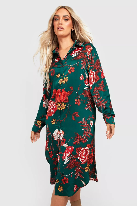 a model dressed in the long sleeve midi shirt dress in green