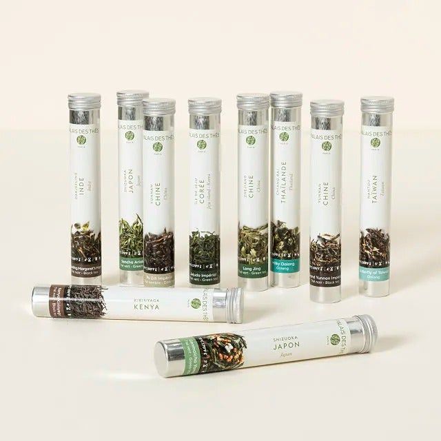 The ten slender tea tubes, each labeled with the tea type, ready to provide a world of flavors.
