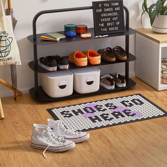 A tile mat with a personalized message engraved on it.