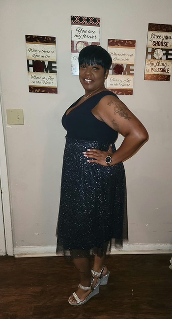 Another reviewer styling the dress with heeled sandals.