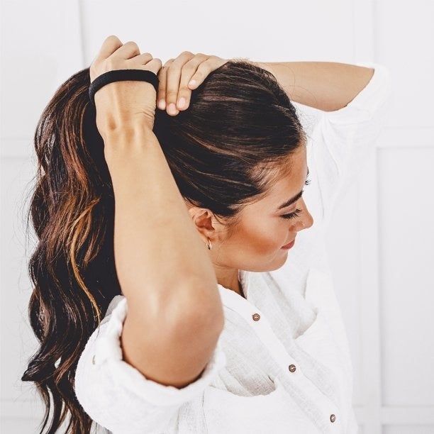 Model using the hair tie