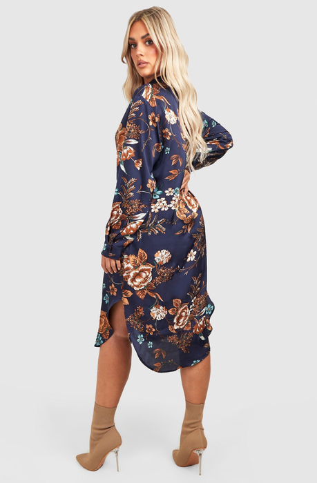 a model showcasing the same dress in navy blue