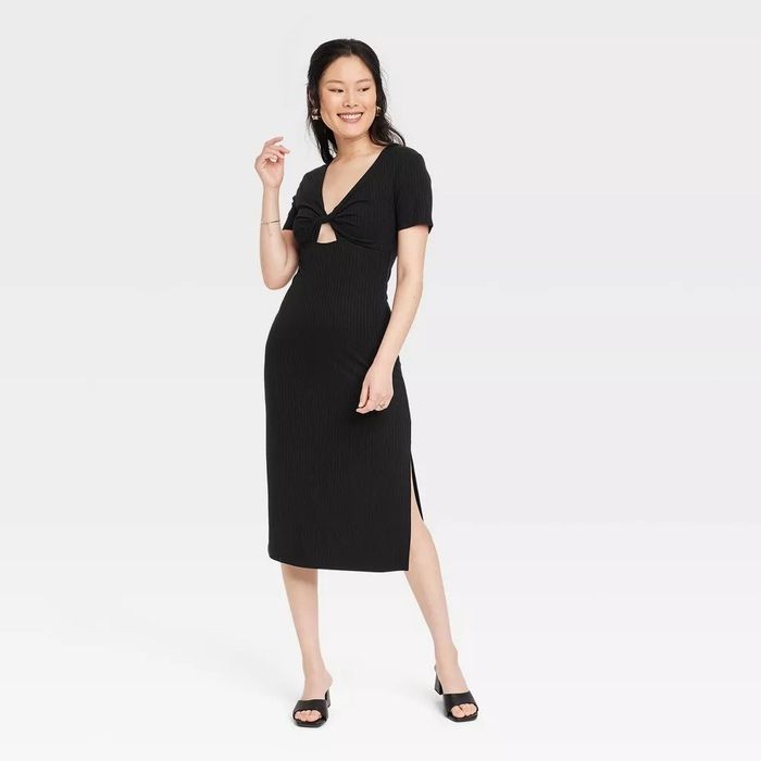 The model is flaunting the cutout dress in sleek black.