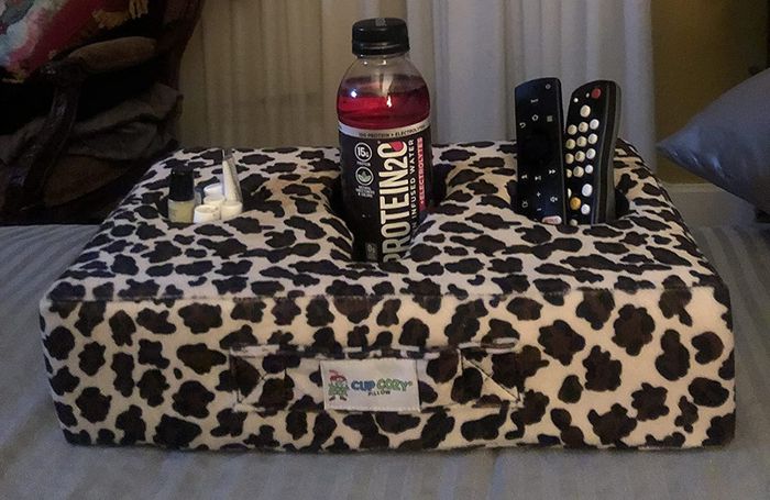 A cheetah print cup cozy pillow.