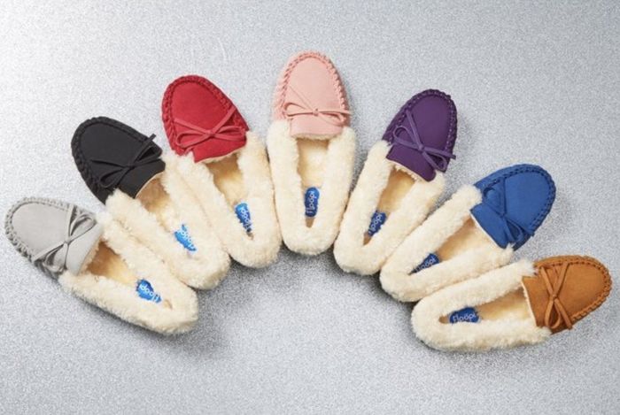 Seven colorful moccasins arranged in an arch formation