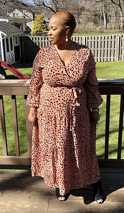 a reviewer wearing the same dress