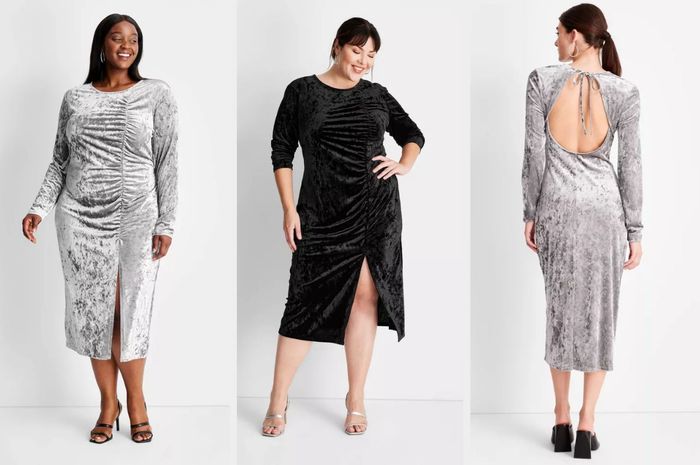 A model wearing a crewneck silver velvet long-sleeve midi dress featuring a ruched bodice, front slit, and black open-toe heels. Another model showcasing the product in black with silver open-toe heels. A third model highlighting the back of the dress, which has a circular cutout and tie-back, paired with black block heels.