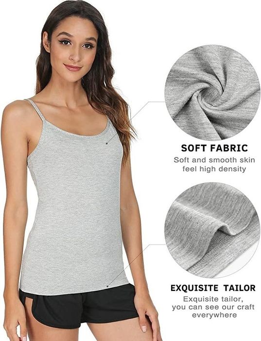 A model wears the gray tank, highlighting the soft fabric and detailed design.