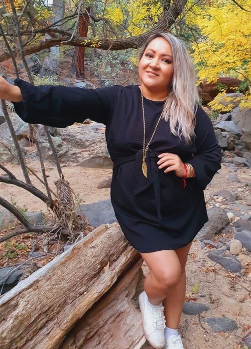 Another reviewer wearing the dress in black.