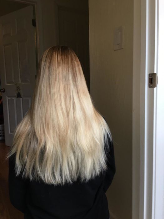 Reviewer's sleek, straight blonde hair