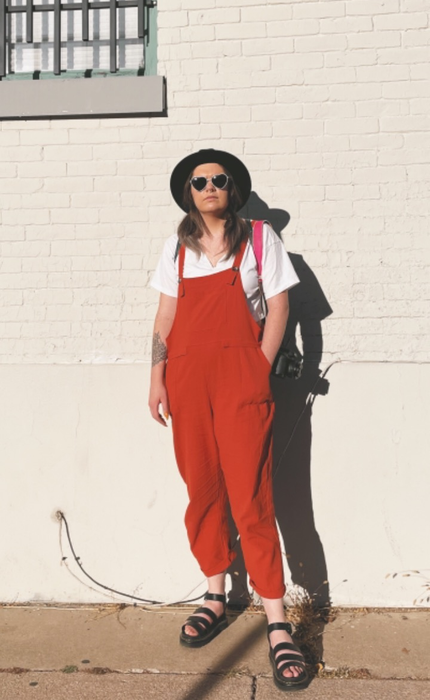 Another reviewer sporting the overalls in red.