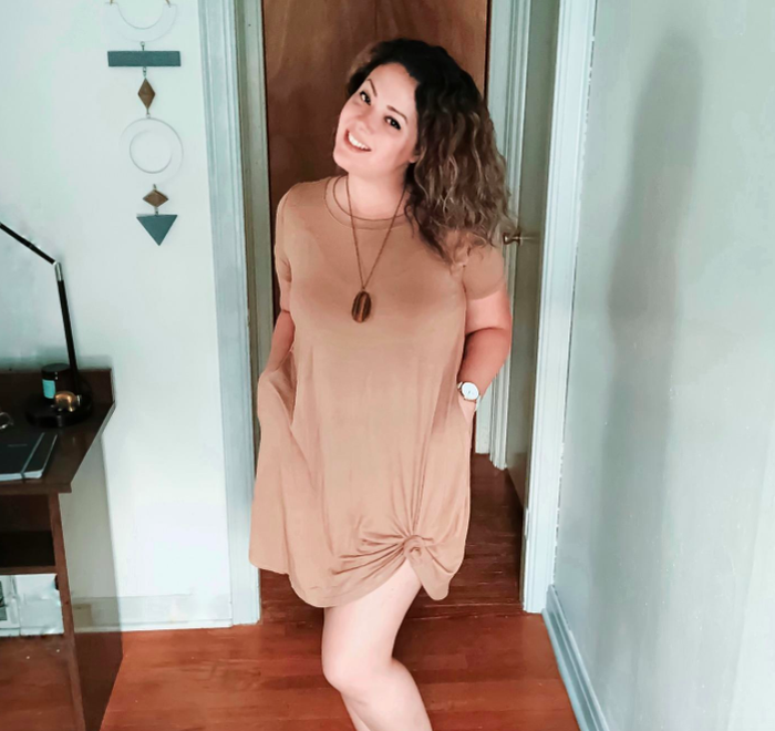 A customer review photo of the T-shirt dress in coffee color.