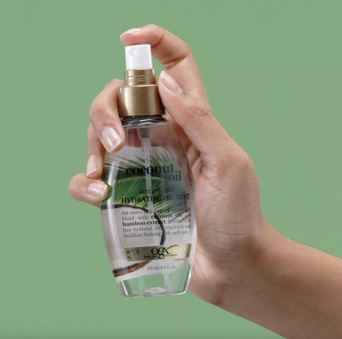 A bottle of hair oil mist