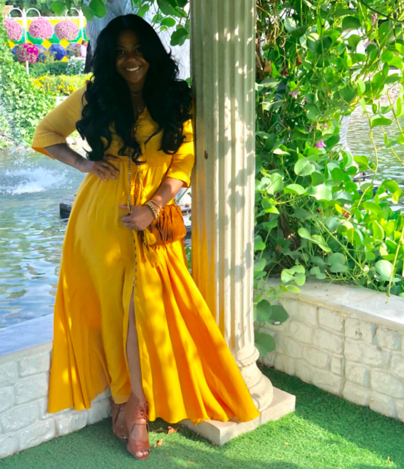A customer review photo of the dress in a vibrant yellow shade.