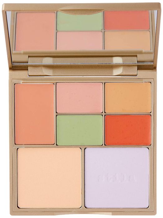 The Stila color-correcting palette, highlighting the various color-correcting creams and finishing powders included.